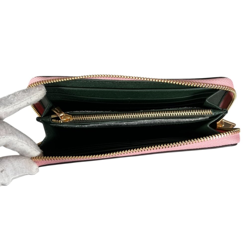 Share Similar items Sponsored See all  Kate Spade Sylvia Continental Zip Around - Picture 5 of 13